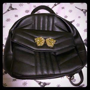 Lion emblem backpack purse